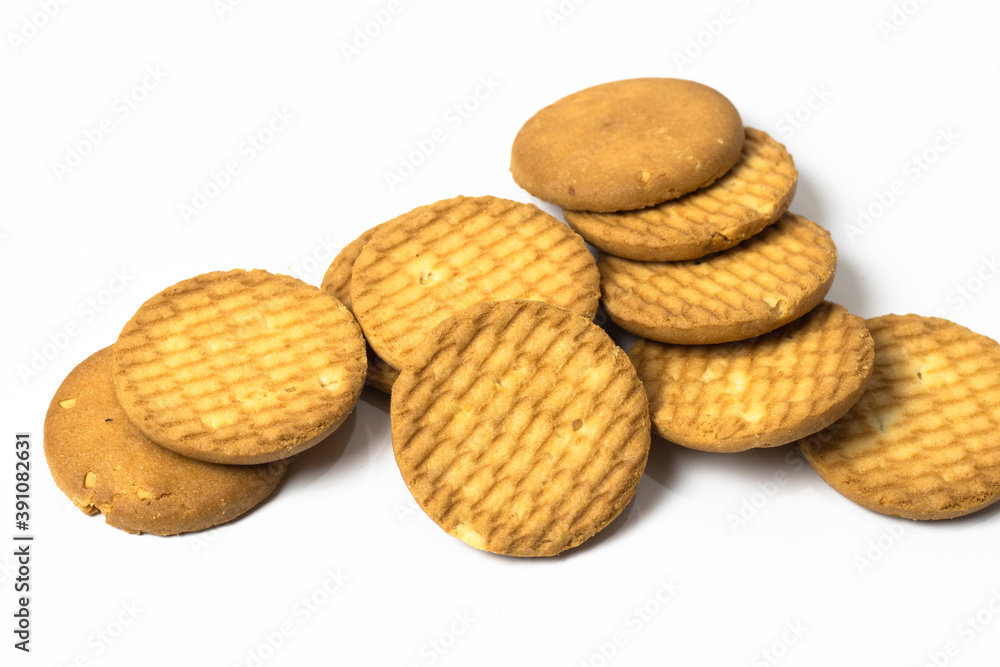 Scattered wheat crispy biscuits isolated on white background Scattered wheat crispy biscuits isolated on white background
