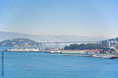 Looking at the Fisherman's Wharf with the San Francisco Oakland Bay Bridge in the background © Ryan Tishken