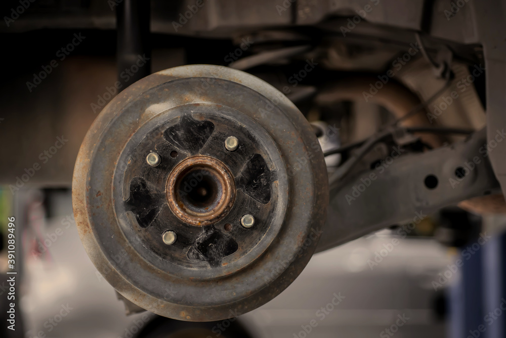 Picture of the rear axle, condition through use, has rust, scratches The wheels were removed for car maintenance and changing wheels-tires Picture of the rear axle, condition through use, has rust, scratches The wheels were removed for car maintenance and changing wheels-tires