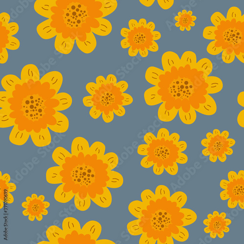 Yellow and orange daisies on a dark gray background. Seamless background. Idea for wallpaper  textiles  packaging. 