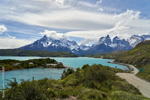 Cuernos, Horns of torres del paine covered with snow, torres del paine national park in the Andes, southern Chile, south America, towering over the turquoise water of lake Pehoe with dramatic clouds