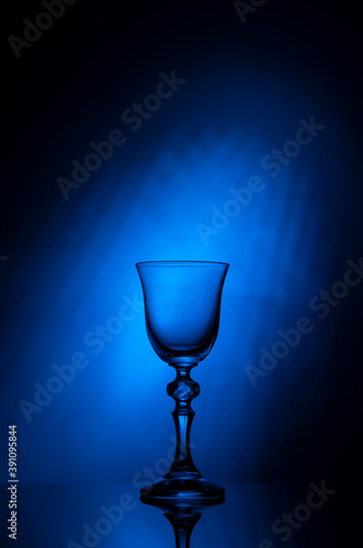  Glass shot glass on blue gradient background