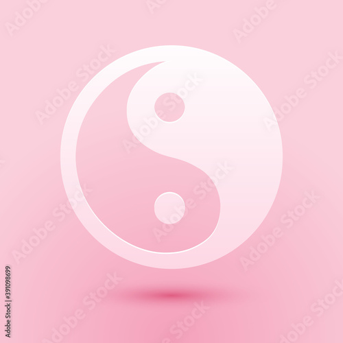 Paper cut Yin Yang symbol of harmony and balance icon isolated on pink background. Paper art style. Vector.