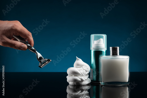 Tableau sur toile Set of shaving tools for men On blue Dark background.