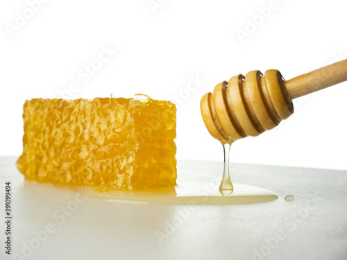 honey dipper and honeycomb