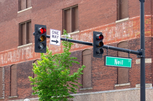 One Way sign and traffic lights