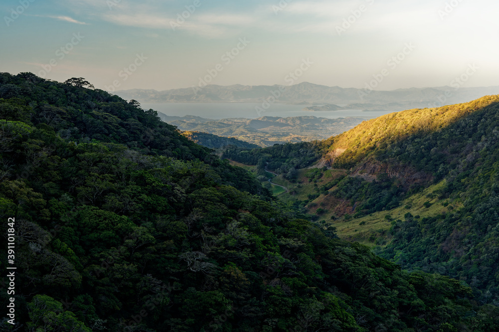 Landscape from Monte Verde in Costa Rica, mountains and green forests, rainforest and bue sky with the clouds