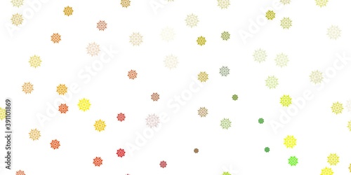Light green, yellow vector pattern with colored snowflakes.