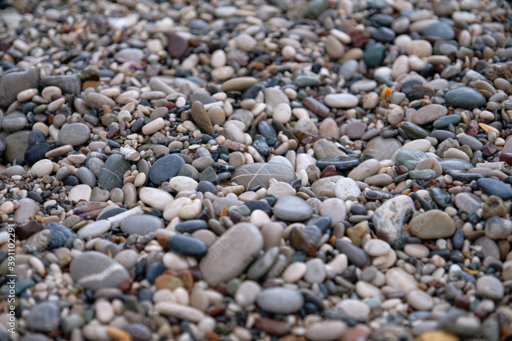 Marine multicolored smooth stones. Background. Marine multicolored smooth stones. Background.