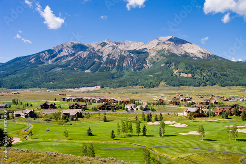 Skyland Golf Course - Small mountain resort town of Crested Butte in Gunnison County, Colorado in summer with Whetstone Mountain rising over the Skyland Residential Community and Golf Course photo