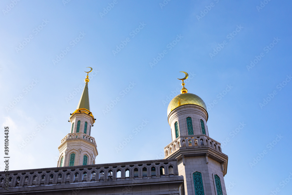 Golden Minarets Moscow Cathedral Mosque with months. The largest Muslim religious building in Russia Golden Minarets Moscow Cathedral Mosque with months. The largest Muslim religious building in Russia