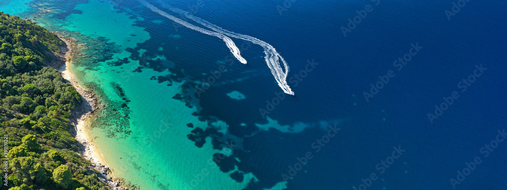 Aerial drone ultra wide panoramic photo of tropical exotic emerald sea wit turquoise crystal clear waters in asian destination island