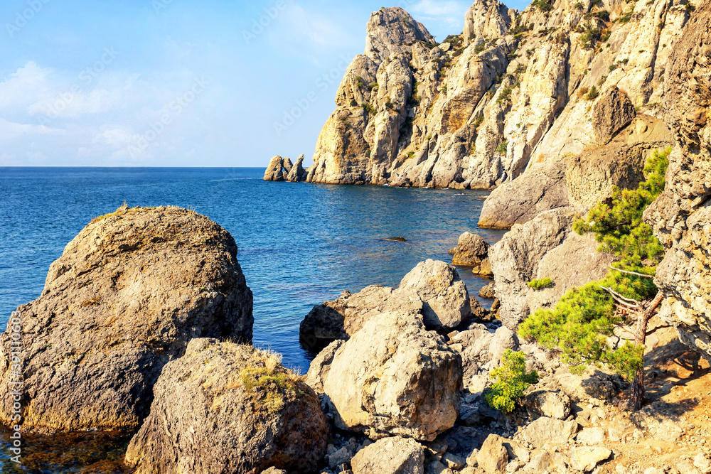 Fototapeta premium Rocky coast of a bay by the sea