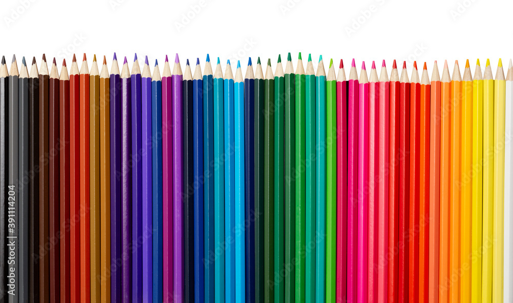 Many colorful pencils in a row isolated on white background. Many colorful pencils in a row isolated on white background.