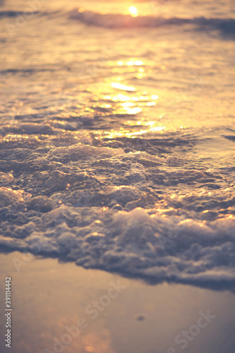 detail of sea waves during sunset