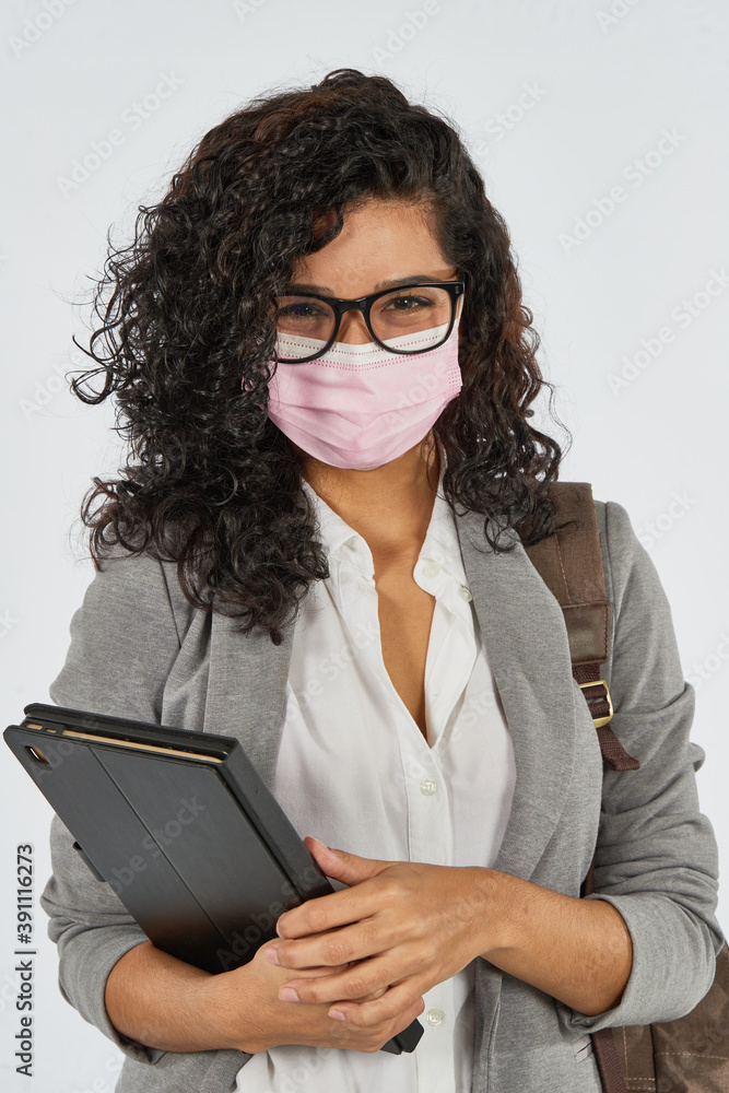 University student ready to study with a mask due to the covid-19 pandemic