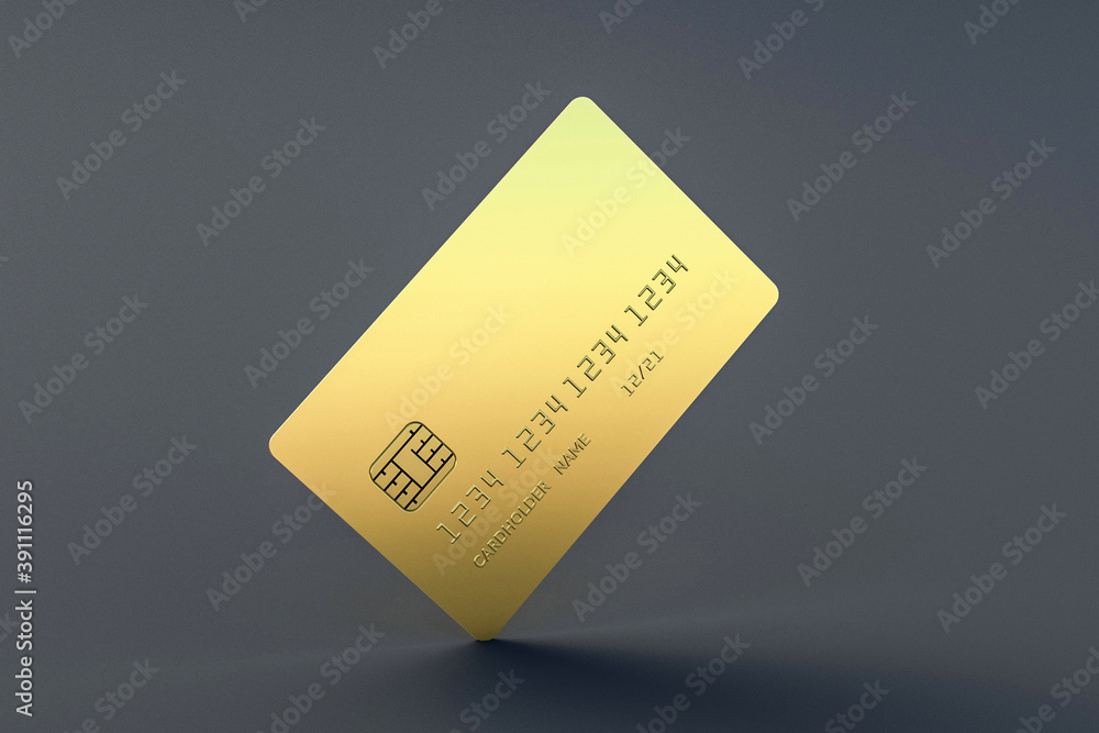 One blank golden credit card on gray background. Concept of luxury life and wealth One blank golden credit card on gray background. Concept of luxury life and wealth