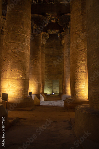 Columns of an egyptian temple at night photo
