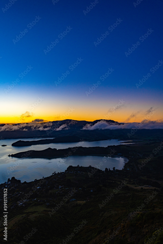 Sunrise at a fjord in New Zealand