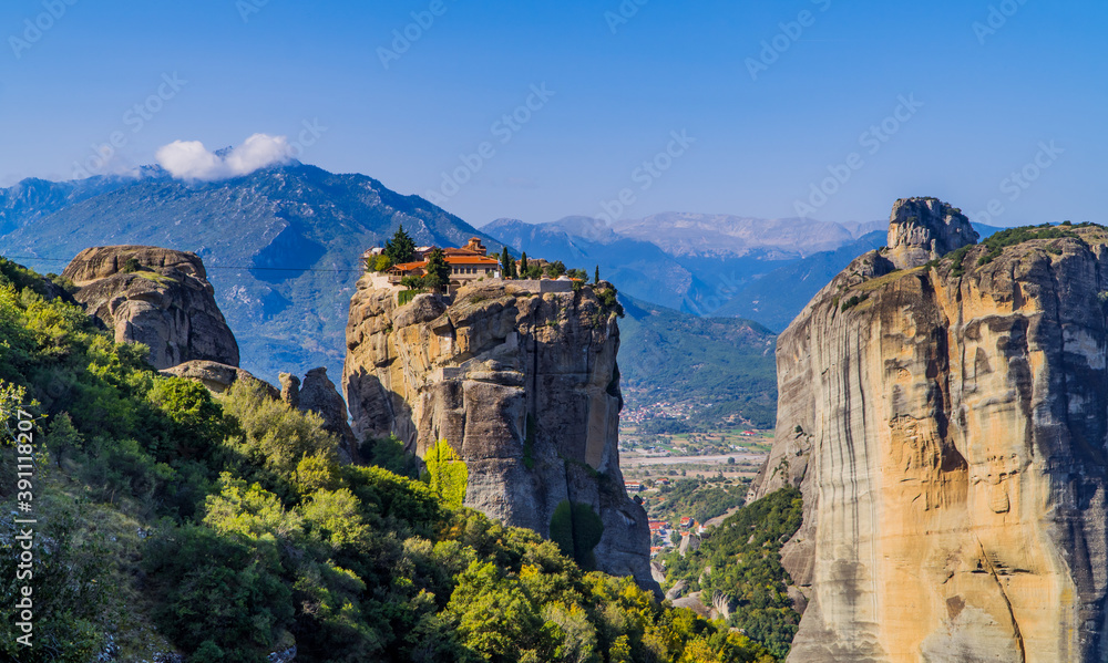 Beautiful panoramic view of the Monastery of the Holy Trinity in Kalambaka, Meteora, Greece with a winch-operated lift