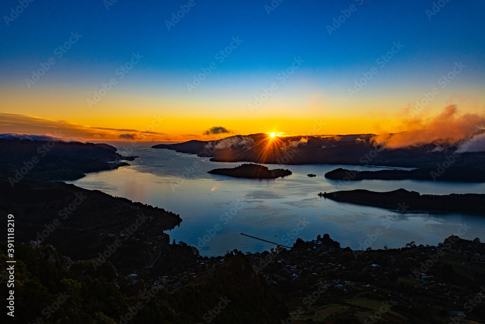 Sunrise at a fjord in New Zealand