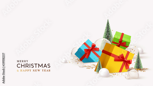 Merry Christmas and Happy New Year design. Realistic gifts boxes lie in snow, fluffy green Christmas tree. glass balls and snowballs. 3d decorative object. Xmas winter background. Holiday gift box