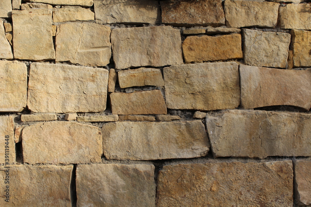 Fototapeta premium Unregelmäßige Natursteinmauer