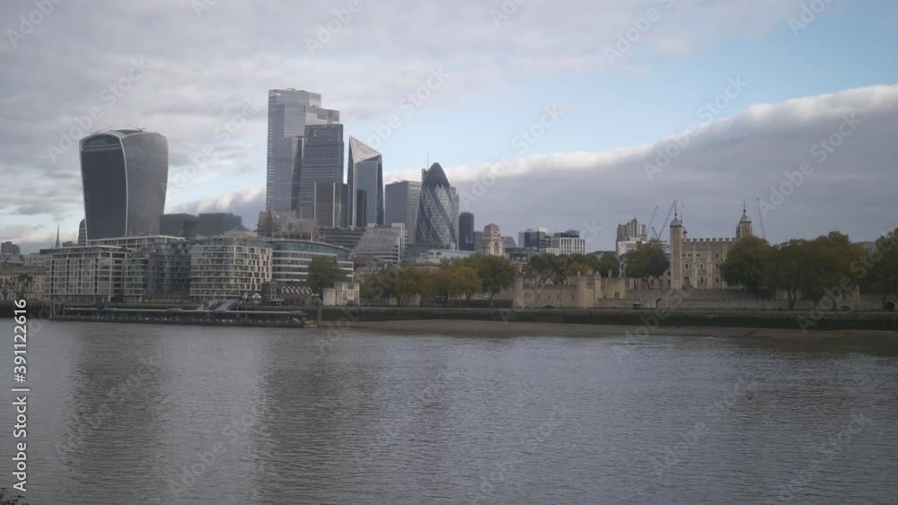 London, England, UK – November 07 2020: High raise building in London City across Thames River. London, England, UK – November 07 2020: High raise building in London City across Thames River.