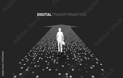 Silhouette of businessman standing on the arrow from pixel. concept of digital transformation of business.