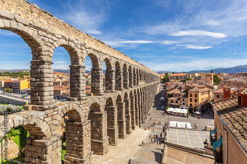 Roman aqueduct bridge and city panorama, Segovia, Spain