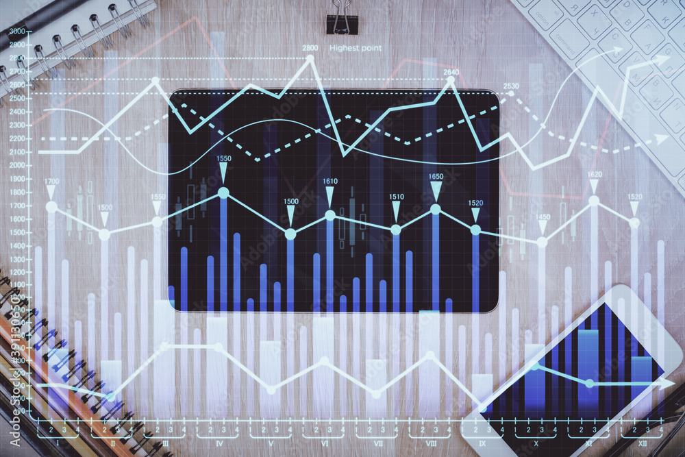 Double exposure of forex graph hologram over desktop with phone. Top view. Mobile trade platform concept. Double exposure of forex graph hologram over desktop with phone. Top view. Mobile trade platform concept.