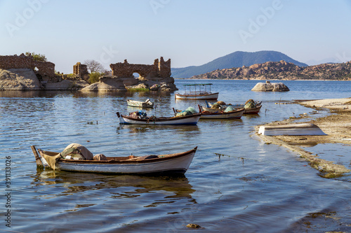 Bafa lake is a peaceful place, ringed by traditional villages such as Kapikiri full of fisherman boats and ruins of Herakleia photo