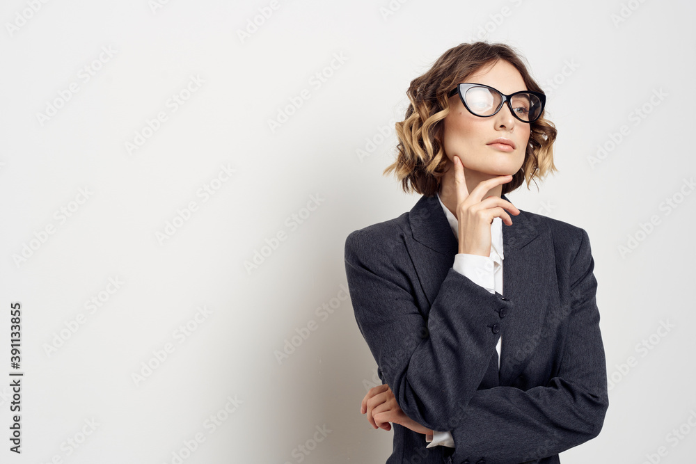 confident business woman in suit gesturing with hands work light background confident business woman in suit gesturing with hands work light background