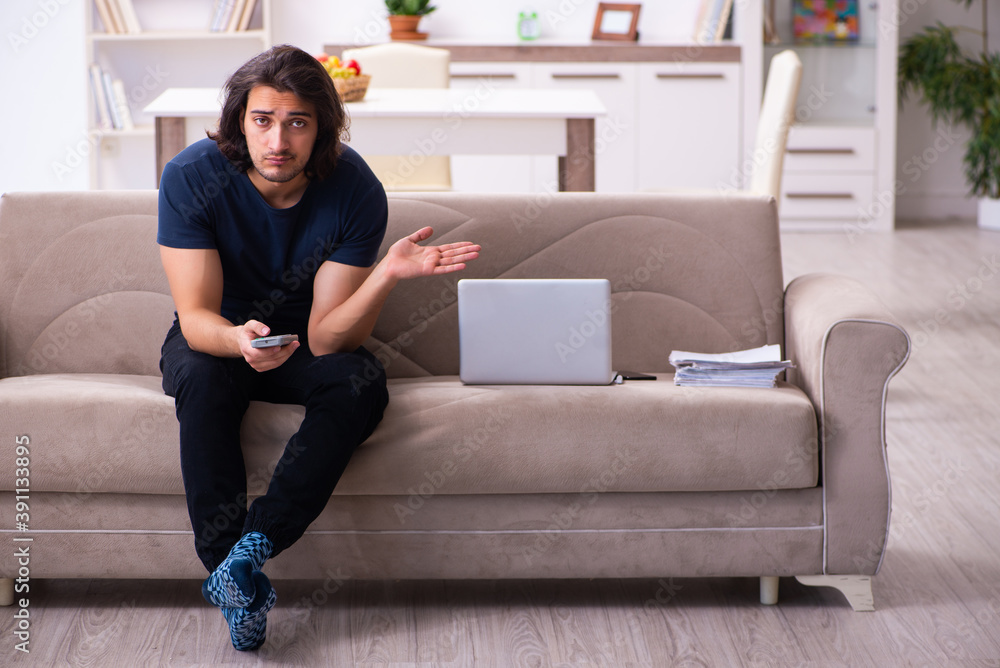 Young man employee working from house Young man employee working from house