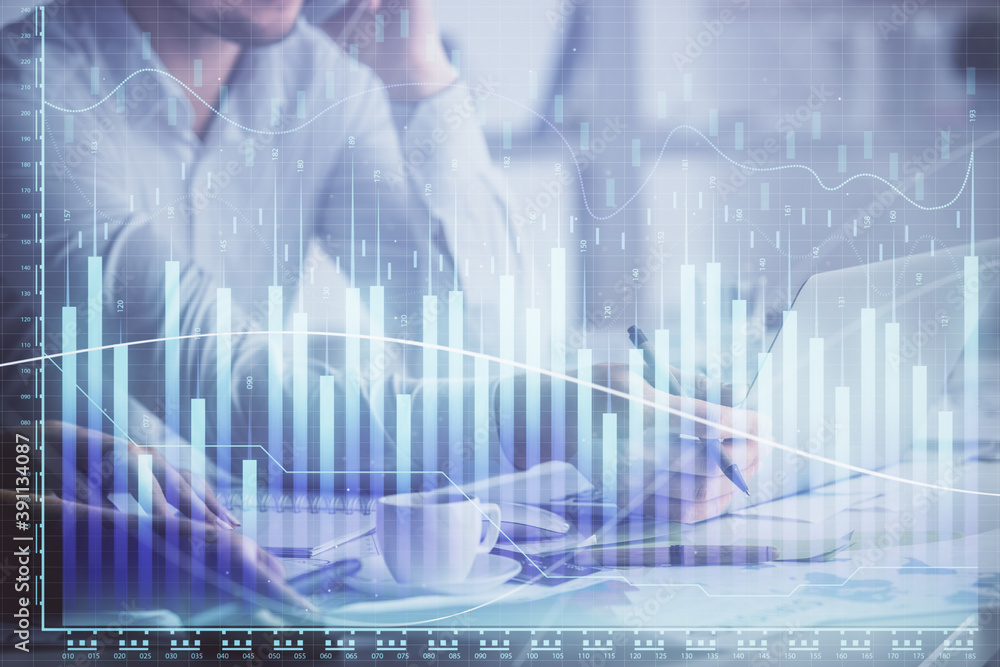 Double exposure of man and woman working together and financial graph hologram. Business concept. Computer background. Double exposure of man and woman working together and financial graph hologram. Business concept. Computer background.