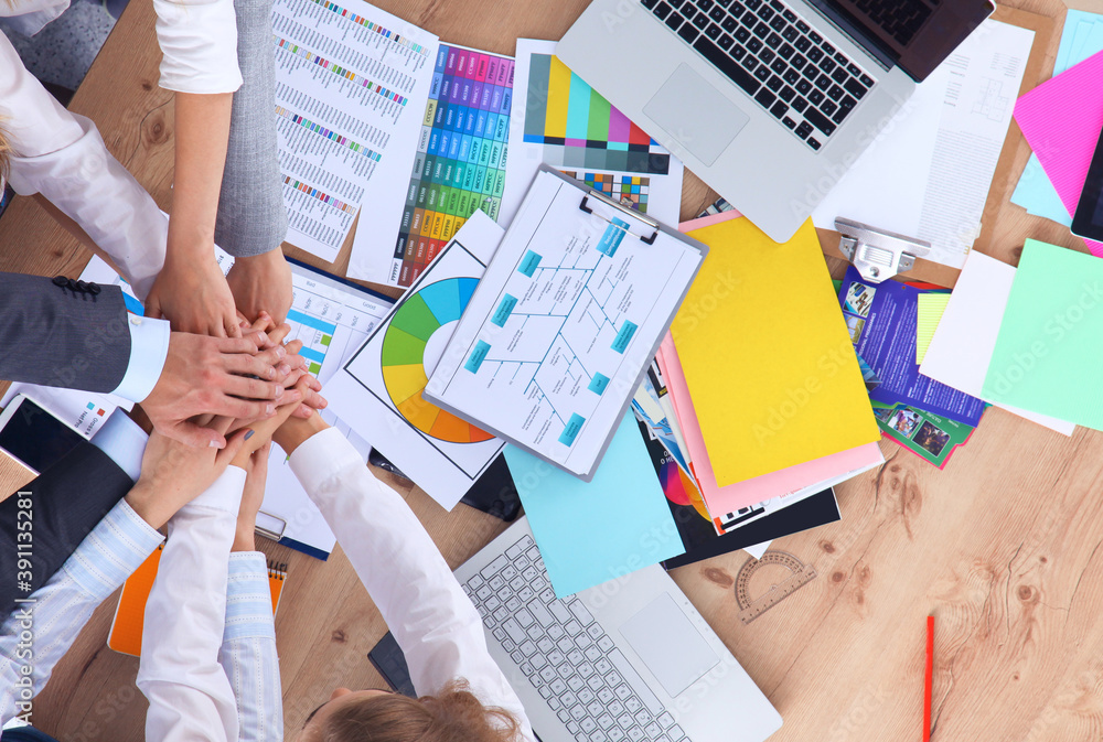Business team with hands together - teamwork concepts Business team with hands together - teamwork concepts