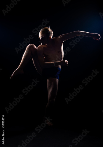 Modern dancer in underwear practicing © qunica.com
