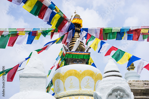 tibetan buddhist prayer flags on a stupa in Namo Buddha monastery in Nepal, spirituality and meditation concept, kora walks and clean karma