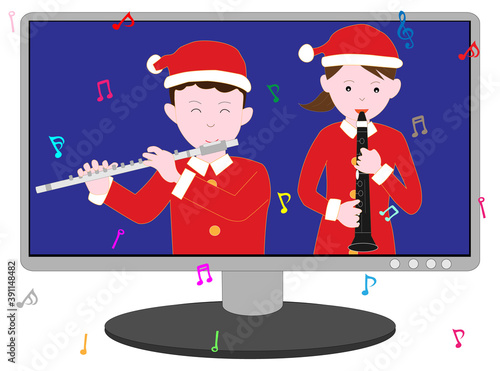 オンラインでクリスマスコンサートをしているカップル。