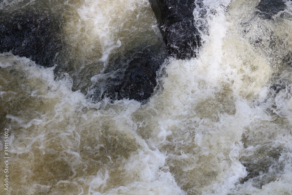 water flowing over rocks water flowing over rocks