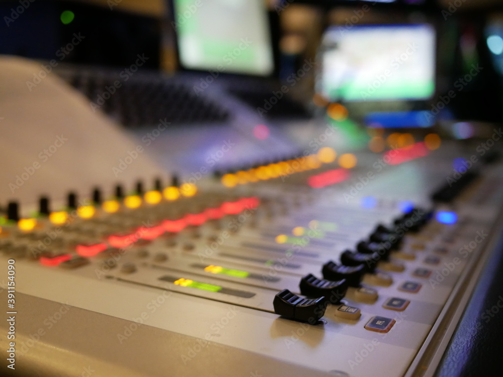 blurred of audio mixer control in studio at TV station. blurred of audio mixer control in studio at TV station.