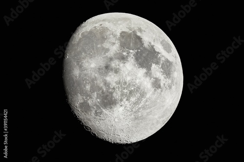 Moon detailed shot, taken at 1600mm focal length, waxing gibbous phase, contrasty details, craters photo
