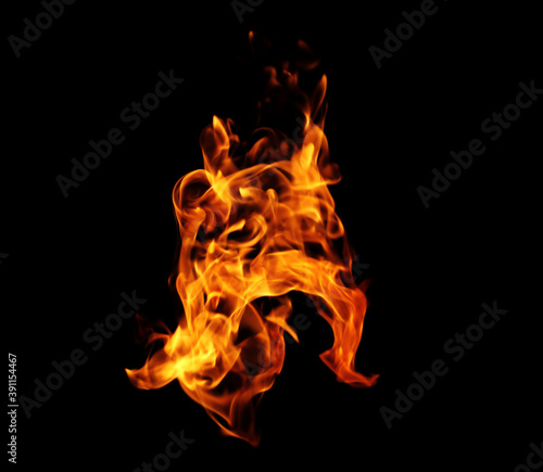 Fire flames on a black background © photodeedooo