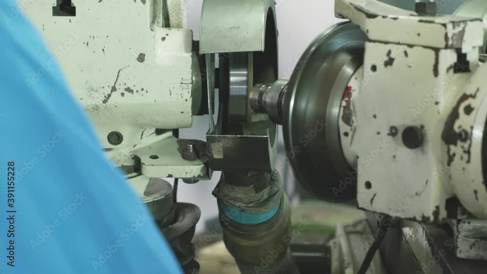 Asian mechanical worker working on milling machine with carefully. Asian mechanical worker working on milling machine with carefully.