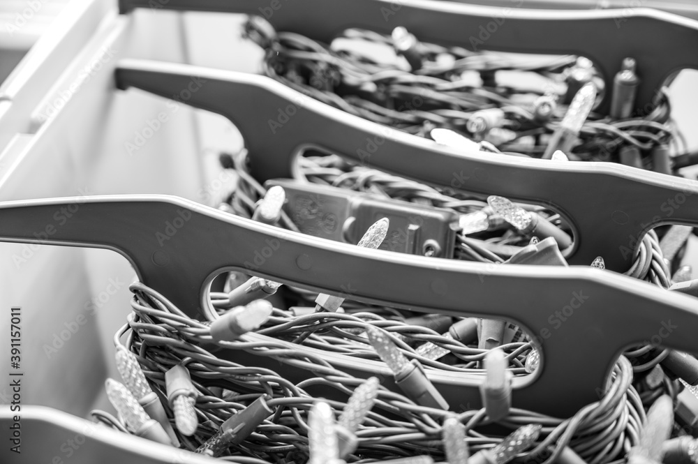 Rows of christmas light strings in an organizer tub Rows of christmas light strings in an organizer tub