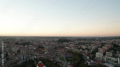 Sanctuary Of Nossa Senhora Da Encarnacao With Panoramic Cityscape At The Background In Leiria, Portugal. - Aerial Drone Shot photo