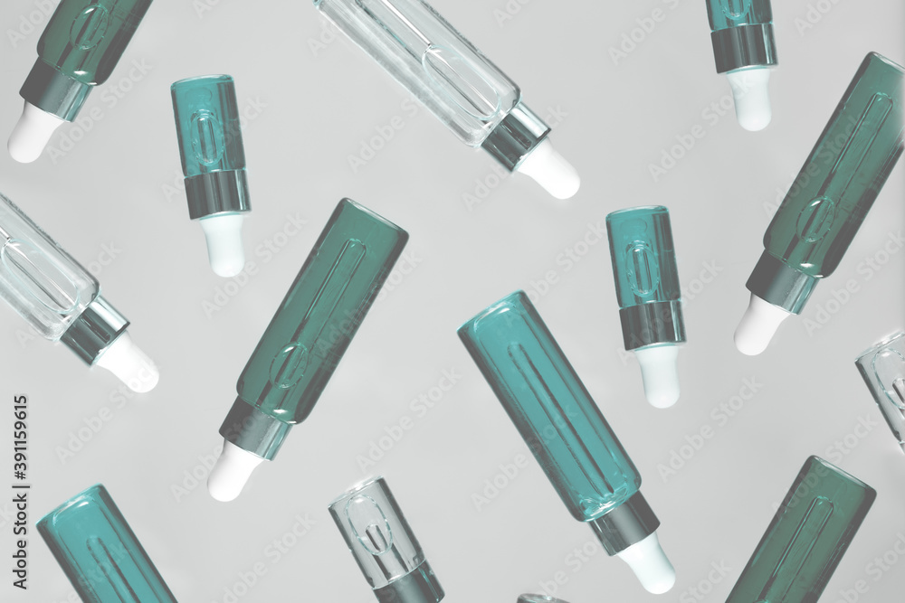 Natural hyaluronic serums flying. Natural materials and skin care concept. Horizontal view copyspace. Natural hyaluronic serums flying. Natural materials and skin care concept. Horizontal view copyspace.