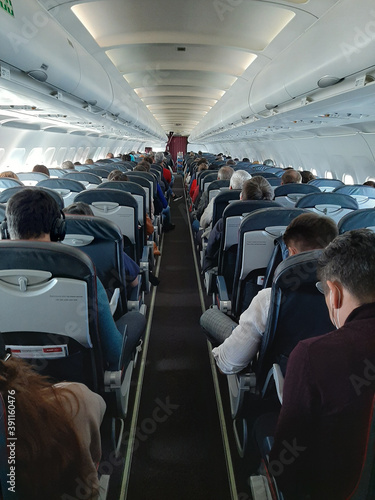  Passengers on the plane. © Elena Blokhina