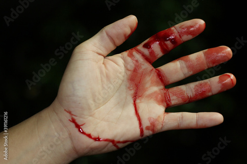 Canvas Print Close up hand injury, Finger cut with knife, real bloody hand