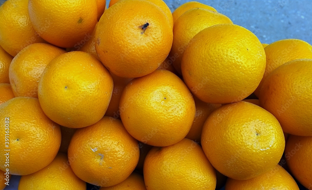 Bunch of Fresh Mandarin Oranges, And Fresh Mandarin Oranges Texture Close Up for Background Bunch of Fresh Mandarin Oranges, And Fresh Mandarin Oranges Texture Close Up for Background